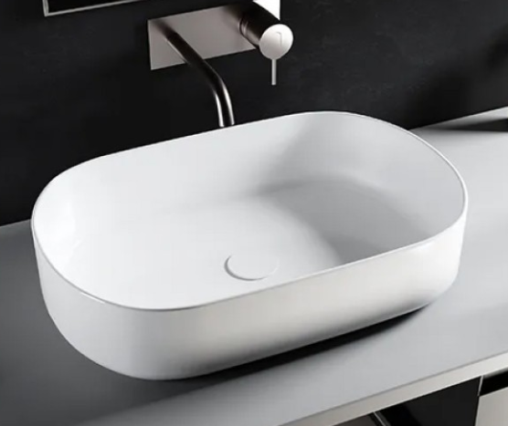 Lavabo da appoggio in ceramica bianca modello Infinity 55